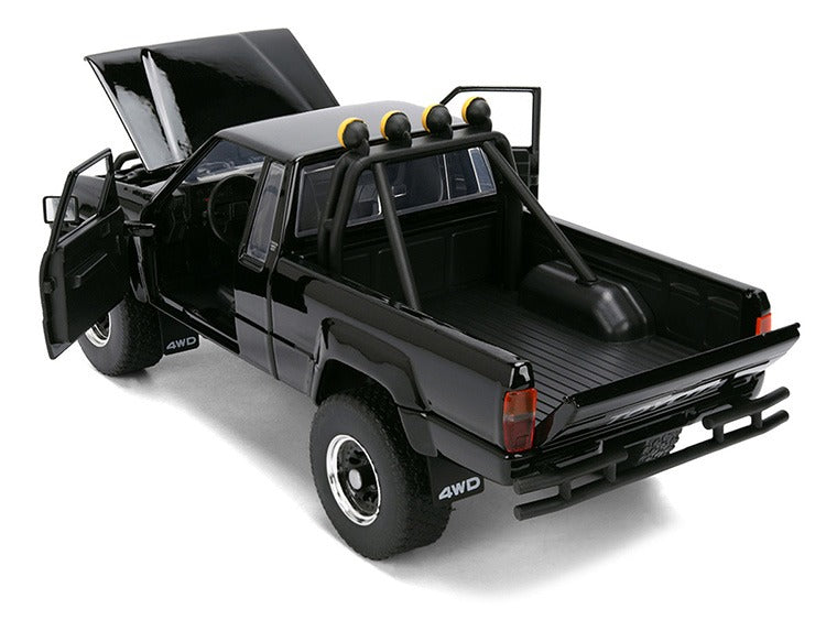Jada 36479 Back To The Future 1985 Toyota SR5 Pick Up Truck with Marty’s Skateboard 1:24 Black