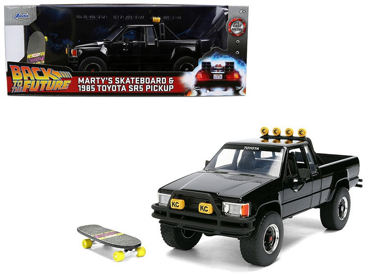 Jada 36479 Back To The Future 1985 Toyota SR5 Pick Up Truck with Marty’s Skateboard 1:24 Black
