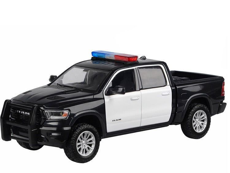 Motormax 79544 2019 Ram 1500 Laramie Crew Cab 1:27 with Light and Sound Black / White