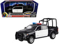 Motormax 79545 2019 Ram 1500 Laramie Crew Cab 1:27 with Stand Cage & Light and Sound Black / White