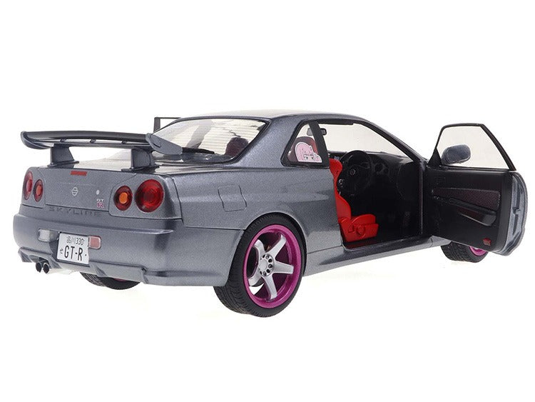 Solido S1804310 1999 Nissan Skyline GT-R R34 1:18 Silver with Purple Wheels