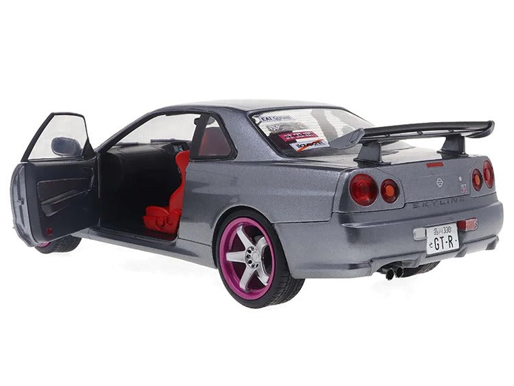 Solido S1804310 1999 Nissan Skyline GT-R R34 1:18 Silver with Purple Wheels